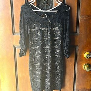 NWT. Black lace dress with low cut back
